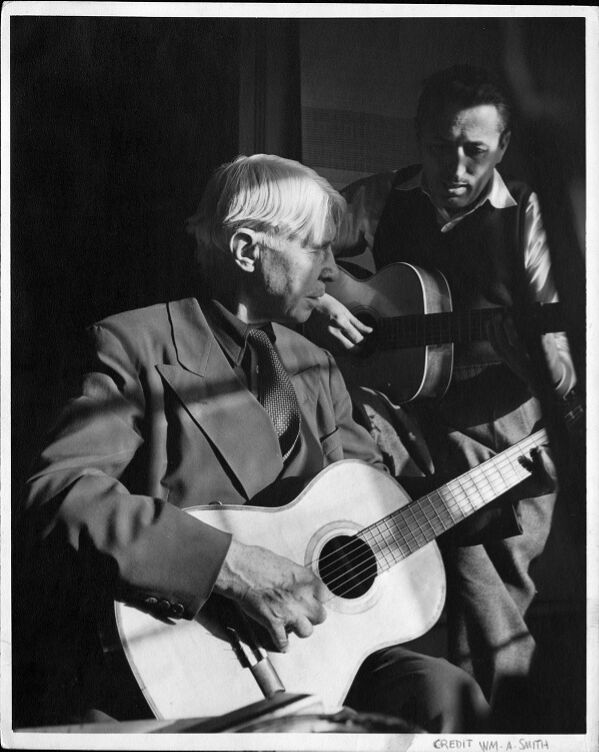 Carl Sandburg & Gregory d'Alessio playing guitars, 1952.