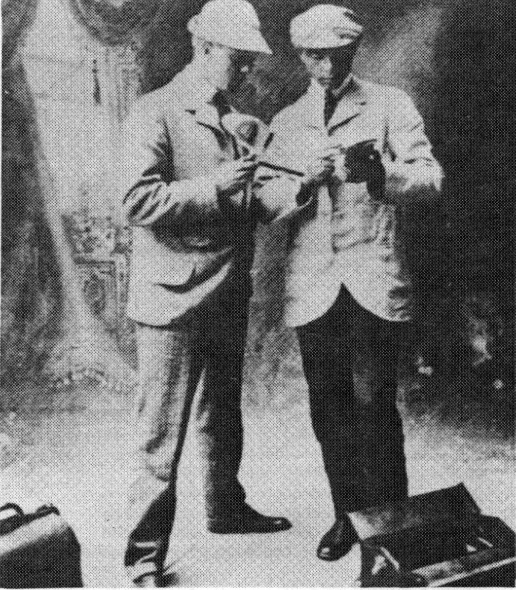 Sandburg and his sales partner, Frederick Dickinson (at left) pose with one of their stereoscope and cards.